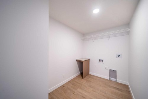 73 Royston Grove Nw, Calgary, AB - Indoor Photo Showing Other Room