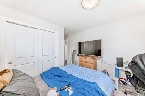 294 Canals Crossing Sw, Airdrie, AB - Indoor Photo Showing Bedroom
