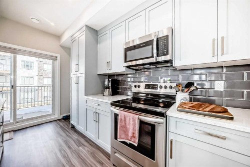 294 Canals Crossing Sw, Airdrie, AB - Indoor Photo Showing Kitchen