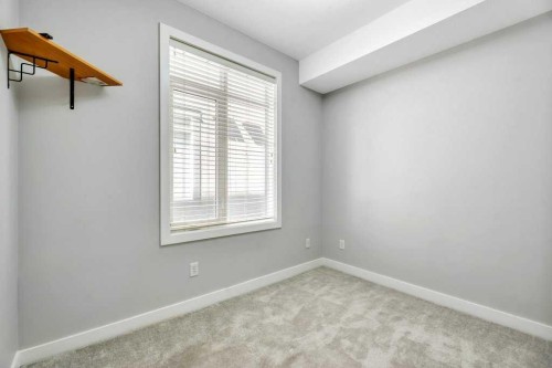 102-1005B Westmount Drive, Strathmore, AB - Indoor Photo Showing Other Room