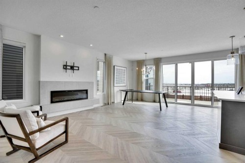 195 Lucas Common Nw, Calgary, AB - Indoor Photo Showing Living Room With Fireplace