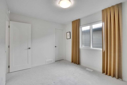 195 Lucas Common Nw, Calgary, AB - Indoor Photo Showing Other Room