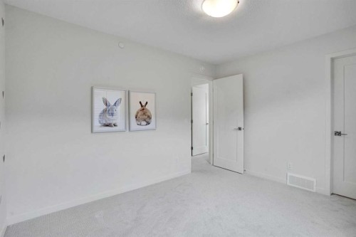 195 Lucas Common Nw, Calgary, AB - Indoor Photo Showing Other Room