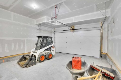 195 Lucas Common Nw, Calgary, AB - Indoor Photo Showing Garage