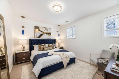 820 9A Street Ne, Calgary, AB - Indoor Photo Showing Bedroom