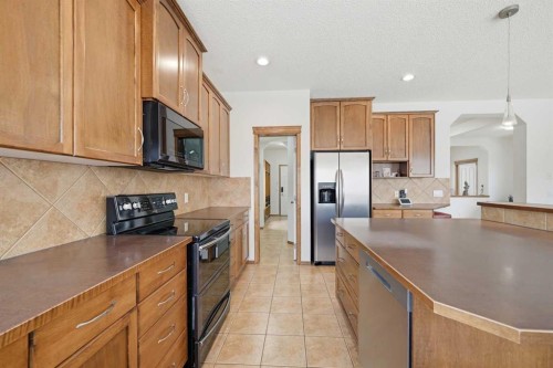 125 Panamount Heath Nw, Calgary, AB - Indoor Photo Showing Kitchen