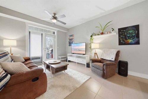 103-201 20 Avenue Ne, Calgary, AB - Indoor Photo Showing Living Room