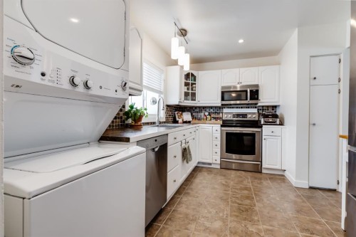 11 Foley Road Se, Calgary, AB - Indoor Photo Showing Laundry Room