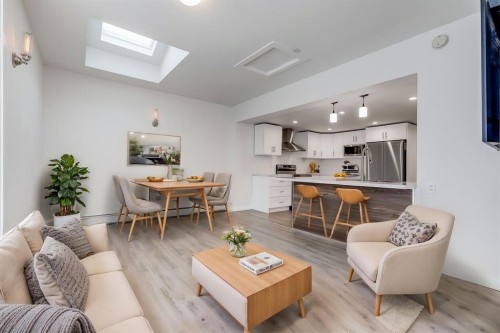 11 Foley Road Se, Calgary, AB - Indoor Photo Showing Living Room