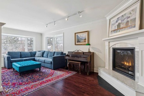 2210 12 Street Sw, Calgary, AB - Indoor Photo Showing Living Room With Fireplace