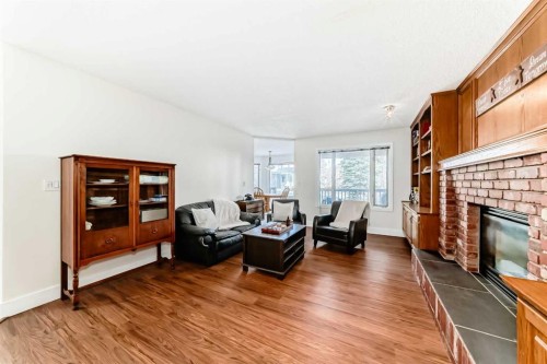 320 Sunmills Drive Se, Calgary, AB - Indoor Photo Showing Living Room With Fireplace