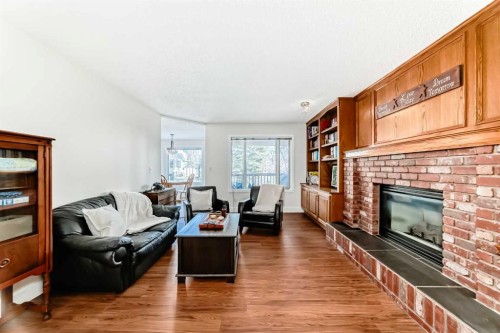 320 Sunmills Drive Se, Calgary, AB - Indoor Photo Showing Living Room With Fireplace