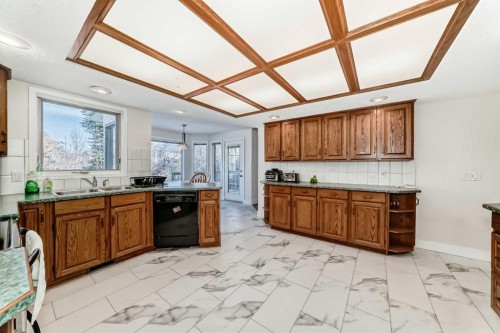 320 Sunmills Drive Se, Calgary, AB - Indoor Photo Showing Kitchen With Double Sink