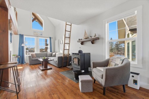 212 Cottageclub Crescent, Rural Rocky View County, AB - Indoor Photo Showing Living Room