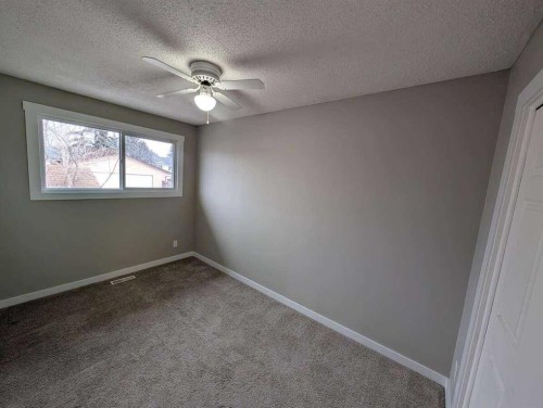 528 Queensland Place Se, Calgary, AB - Indoor Photo Showing Other Room