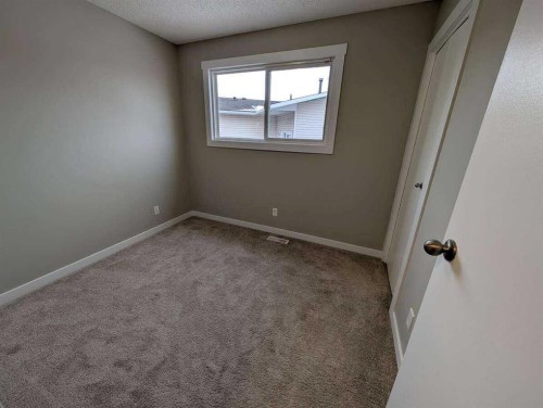528 Queensland Place Se, Calgary, AB - Indoor Photo Showing Other Room