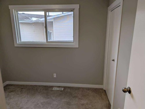 528 Queensland Place Se, Calgary, AB - Indoor Photo Showing Other Room