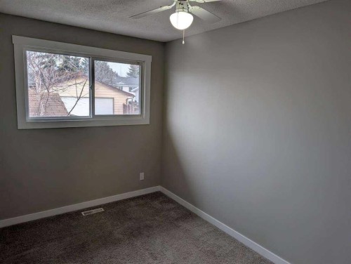 528 Queensland Place Se, Calgary, AB - Indoor Photo Showing Other Room