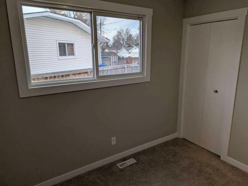 528 Queensland Place Se, Calgary, AB - Indoor Photo Showing Other Room