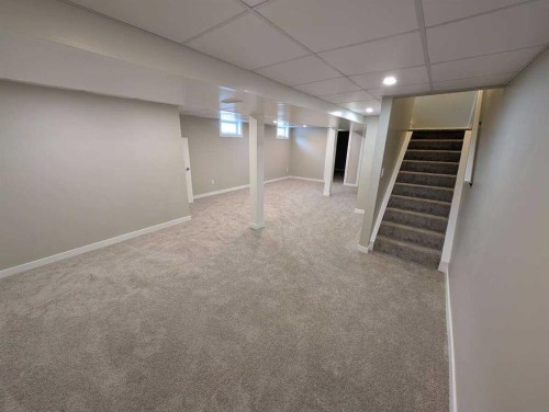 528 Queensland Place Se, Calgary, AB - Indoor Photo Showing Basement