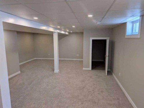 528 Queensland Place Se, Calgary, AB - Indoor Photo Showing Other Room