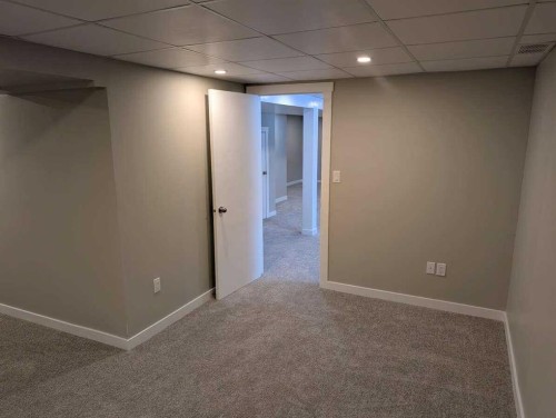 528 Queensland Place Se, Calgary, AB - Indoor Photo Showing Other Room