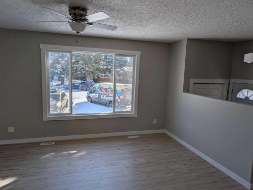 528 Queensland Place Se, Calgary, AB - Indoor Photo Showing Other Room