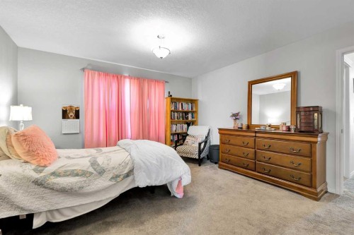 2 Saddleland Way Ne, Calgary, AB - Indoor Photo Showing Bedroom