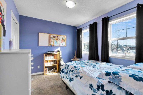 2 Saddleland Way Ne, Calgary, AB - Indoor Photo Showing Bedroom