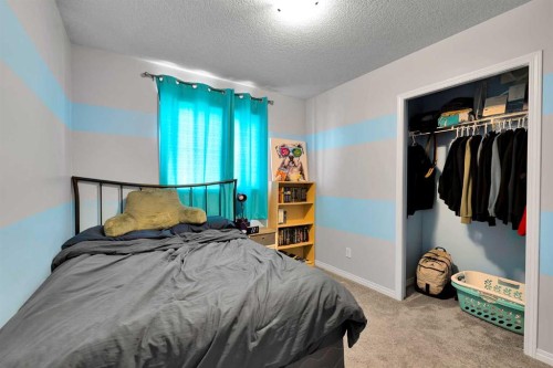 2 Saddleland Way Ne, Calgary, AB - Indoor Photo Showing Bedroom