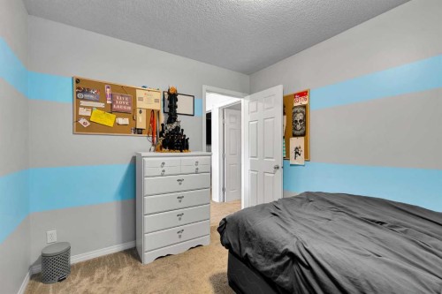 2 Saddleland Way Ne, Calgary, AB - Indoor Photo Showing Bedroom