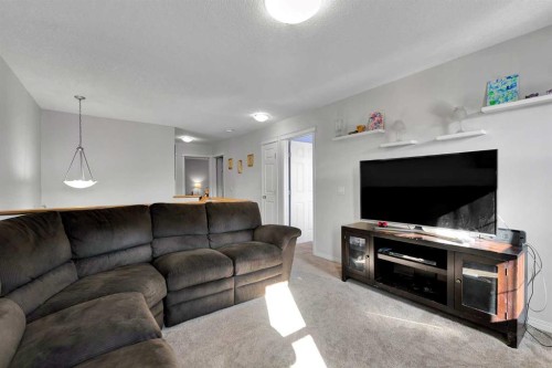 2 Saddleland Way Ne, Calgary, AB - Indoor Photo Showing Living Room