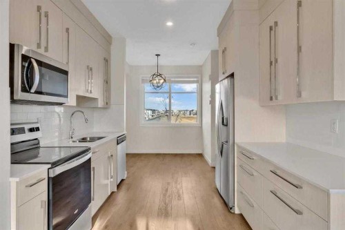 6323 128 Avenue Ne, Calgary, AB - Indoor Photo Showing Kitchen With Double Sink With Upgraded Kitchen