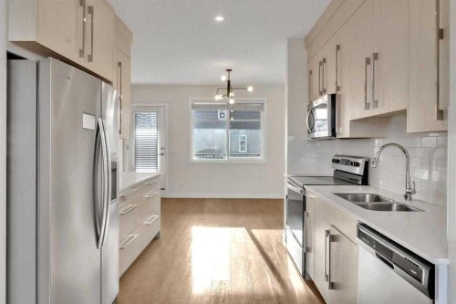 6323 128 Avenue Ne, Calgary, AB - Indoor Photo Showing Kitchen With Stainless Steel Kitchen With Double Sink With Upgraded Kitchen