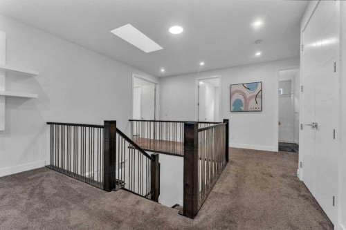 205 Kinniburgh Cove, Chestermere, AB - Indoor Photo Showing Other Room