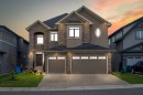 205 Kinniburgh Cove, Chestermere, AB  - Outdoor With Facade 