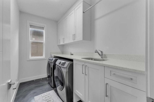 205 Kinniburgh Cove, Chestermere, AB - Indoor Photo Showing Laundry Room