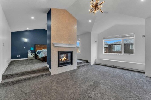 205 Kinniburgh Cove, Chestermere, AB - Indoor With Fireplace