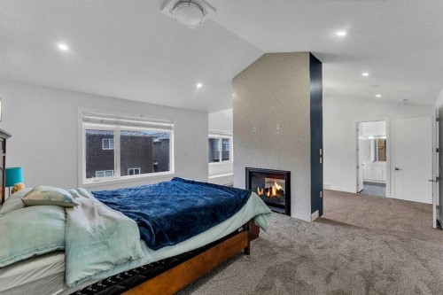 205 Kinniburgh Cove, Chestermere, AB - Indoor Photo Showing Bedroom