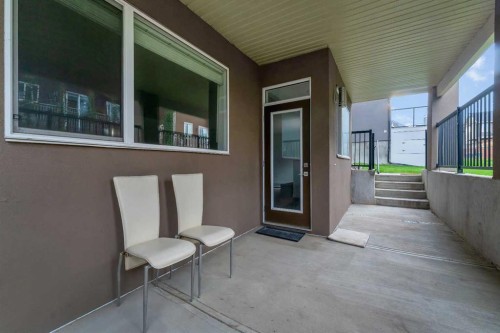 205 Kinniburgh Cove, Chestermere, AB - Outdoor With Deck Patio Veranda With Exterior
