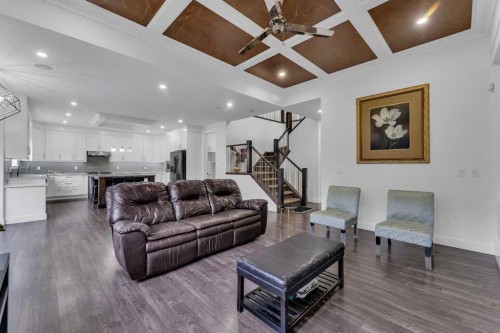 205 Kinniburgh Cove, Chestermere, AB - Indoor Photo Showing Living Room