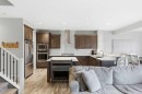 10 Riviera Place, Cochrane, AB  - Indoor Photo Showing Kitchen With Upgraded Kitchen 