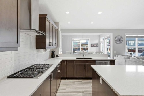 10 Riviera Place, Cochrane, AB - Indoor Photo Showing Kitchen With Upgraded Kitchen