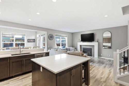 10 Riviera Place, Cochrane, AB - Indoor With Fireplace