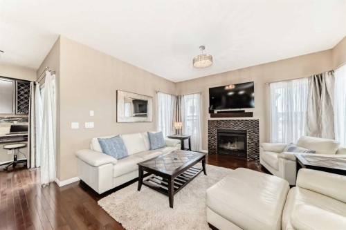301 Kincora Glen Rise Nw, Calgary, AB - Indoor Photo Showing Living Room With Fireplace