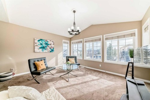 301 Kincora Glen Rise Nw, Calgary, AB - Indoor Photo Showing Living Room With Fireplace