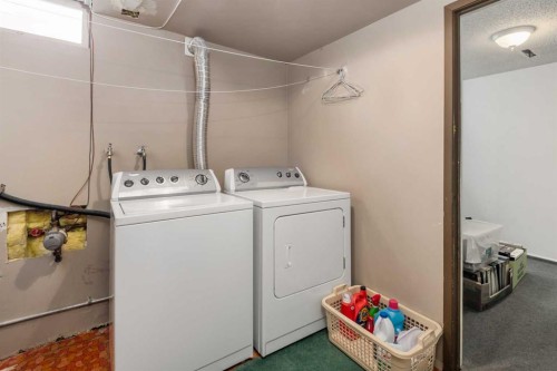 5039 Nemiskam Road Nw, Calgary, AB - Indoor Photo Showing Laundry Room