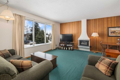 5039 Nemiskam Road Nw, Calgary, AB - Indoor Photo Showing Living Room