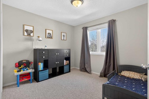 389 Elgin Way Se, Calgary, AB - Indoor Photo Showing Bedroom