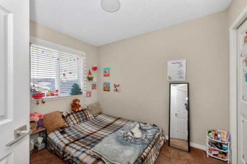 246 Saddlebrook Way Ne, Calgary, AB - Indoor Photo Showing Bedroom